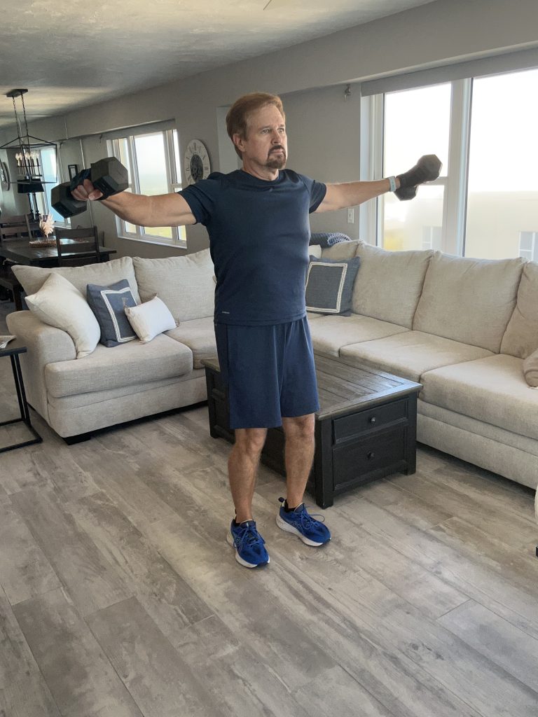 dumbbell lateral raise end